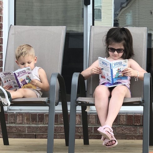 Reading on the back porch