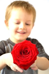 kid with rose