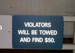 Violators will be towed and find 50