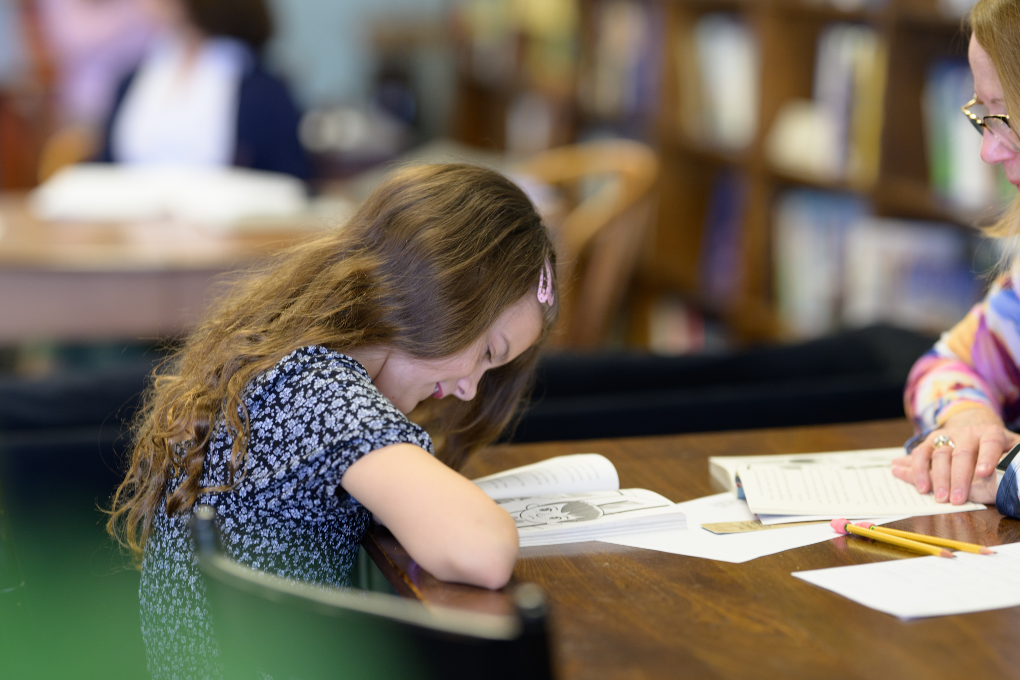 kids tutor Book Bums. by Malinda Hartong, @TheHartongs | Photojournalists